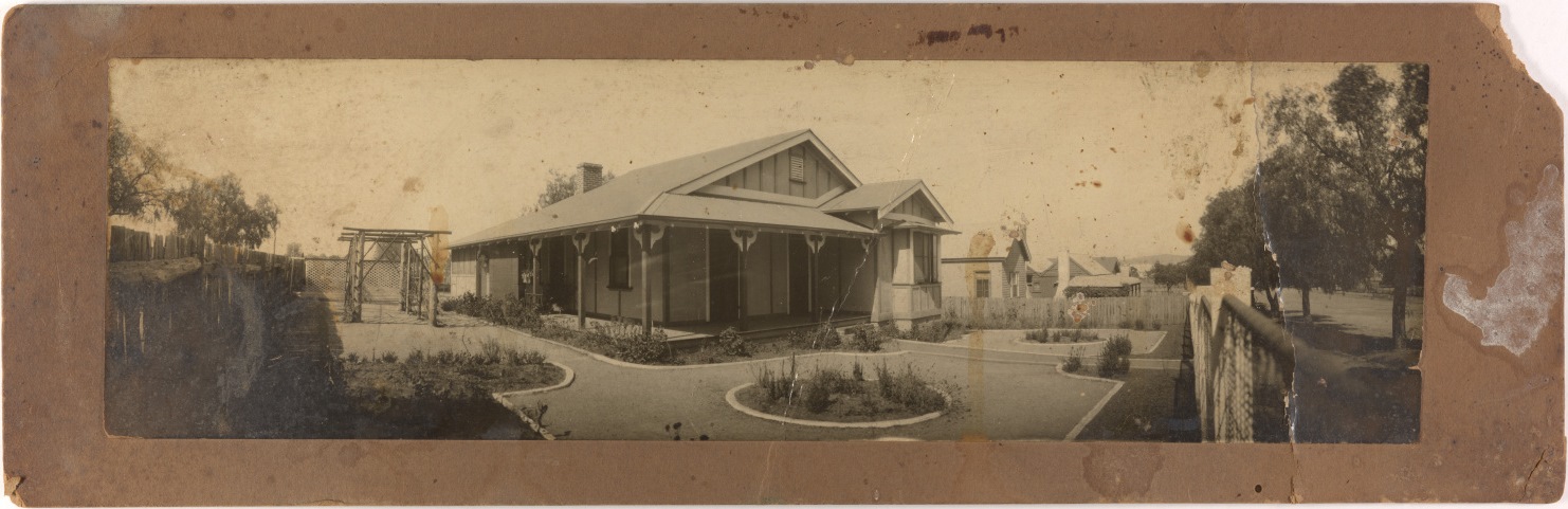 Unidentified Federation house with a formal garden and rustic pergola, around 1910 / photographer unknown